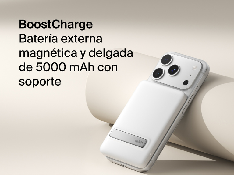 Belkin BoostCharge Slim Magnetic Power Bank 5K with Qi2 wirelessly attached to a smartphone, featuring a slim magnetic design with integrated card storage for portable on-the-go charging.